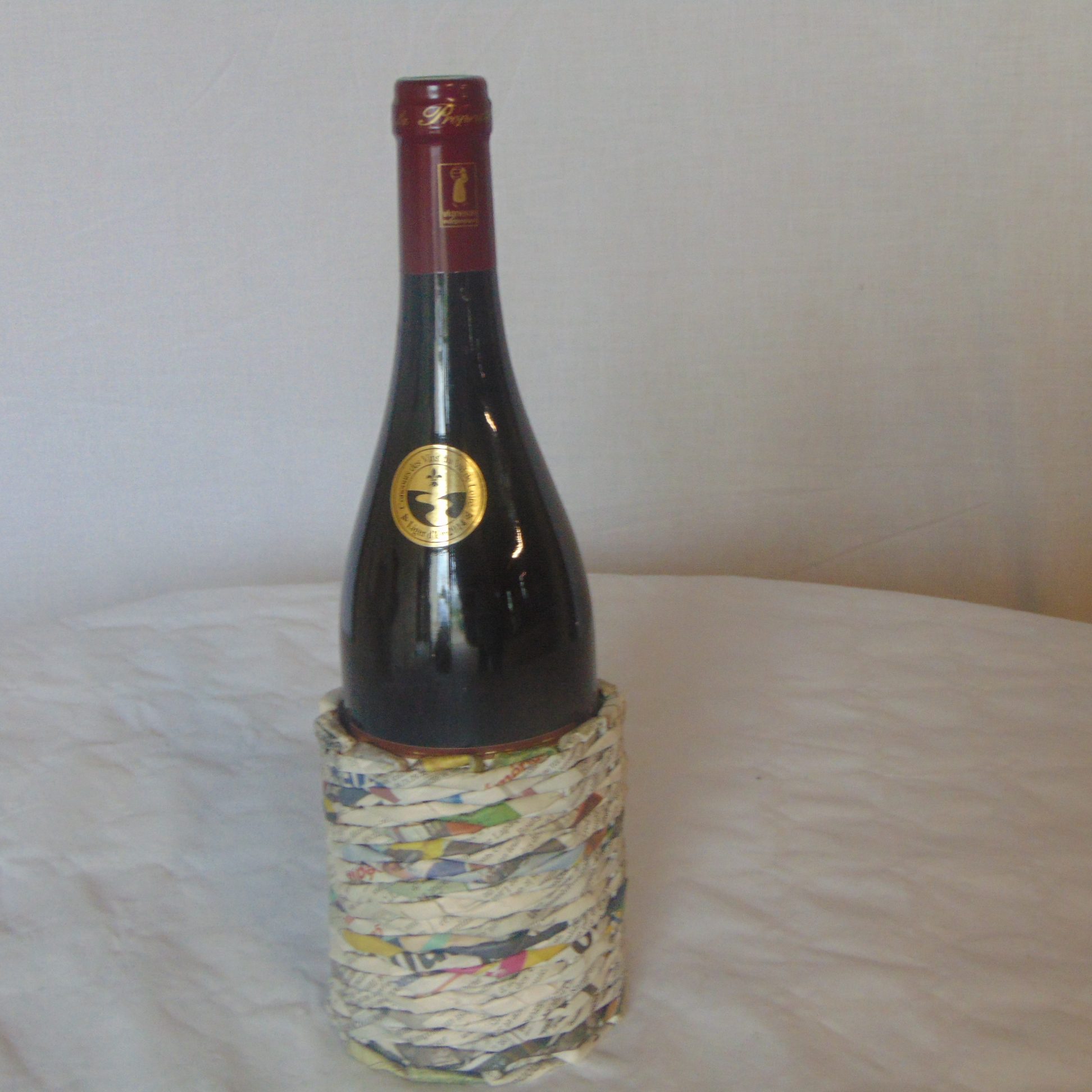 Porte Bouteille tressé en journal brut
